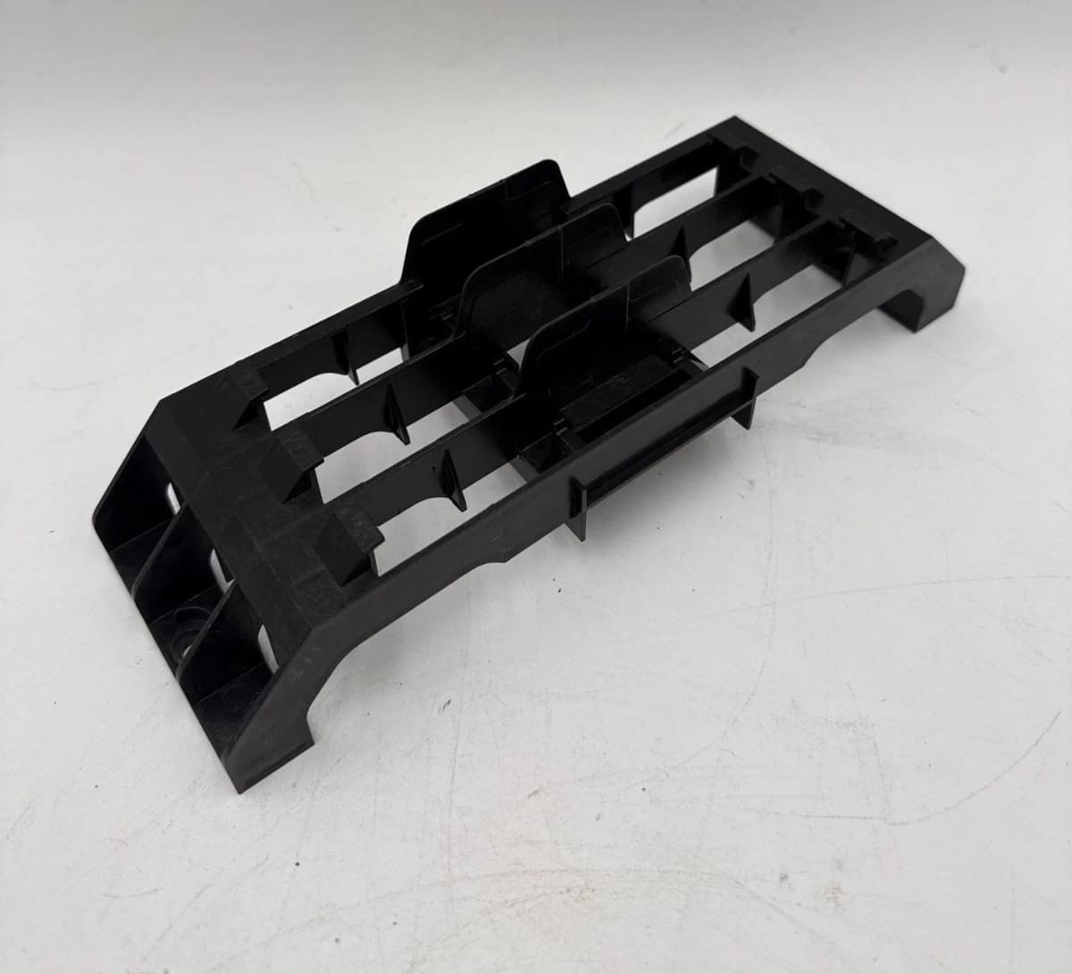 GE 911E347P3 Panel Holder 3 Position Black Plastic Panelboard Accessory – image 1